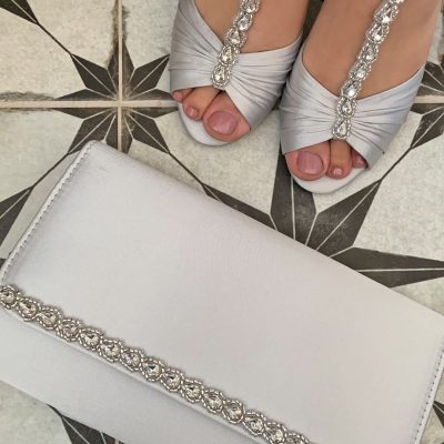 Dolly silver lifestyle 2 with bag | The Perfect Bridal Company